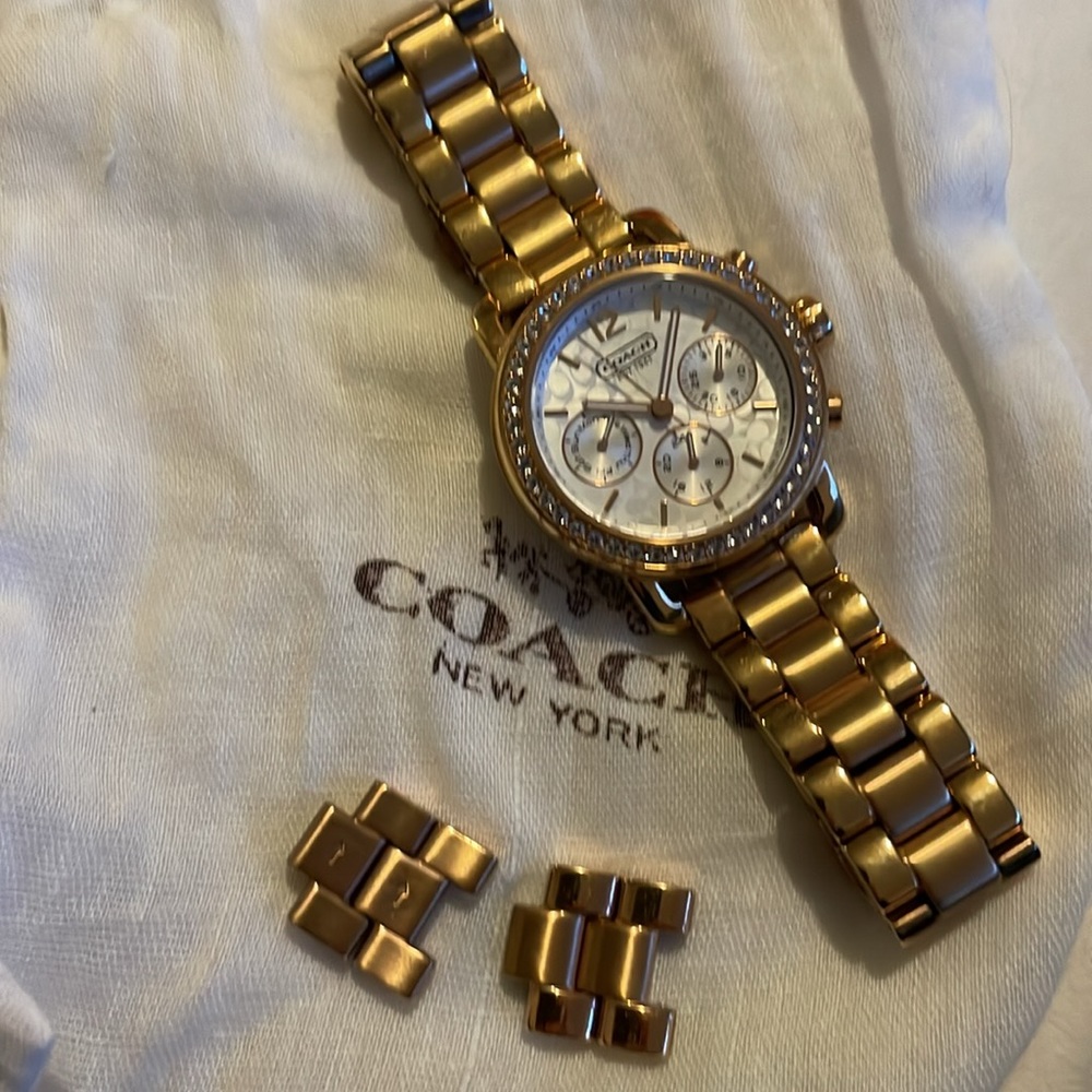 Coach women’s watch, gold.